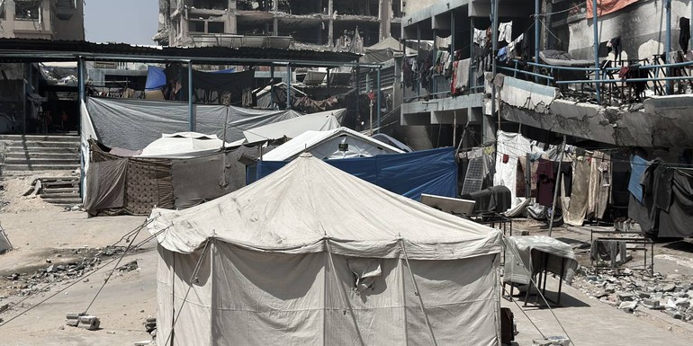 UNRWA Forcibly displaced people seek shelter in a destroyed UNRWA school in Gaza City, the Gaza Strip, June 2025. © 2025 UNRWA photo.jpg