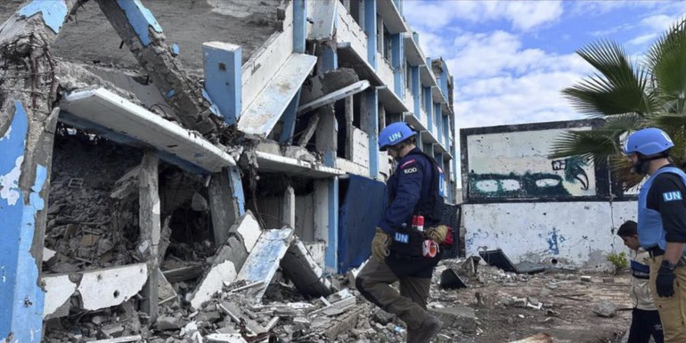 jpg - A joint OCHA and United Nations Mine Action Service team assesses a school in Gaza to identify any risks of unexploded ordnance. Photo OCHA Zein Tayyeb.jpg